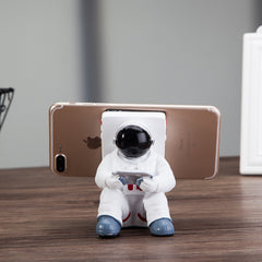 シンプルな宇宙飛行士の携帯電話スタンド 学生用デスクトップホルダー かわいい宇宙飛行士の携帯電話ホルダー クリエイティブギフト 小さなデスク装飾